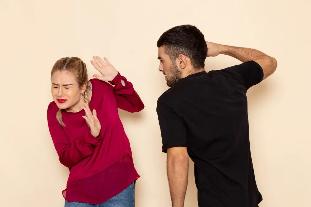 https://thephrase.s3.ap-southeast-1.amazonaws.com/2022/10/front-view-young-female-red-shirt-suffers-from-physical-threats-violence-cream-space-female-cloth-photo-violence-domestic.jpg